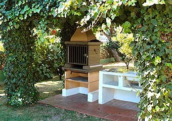 Barbecue area at Torrenueva Park Apartment