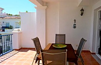 Jasmin apartment Terrace views over the swimming pool & down to the sea