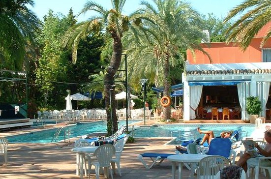 opposite the swimming pool